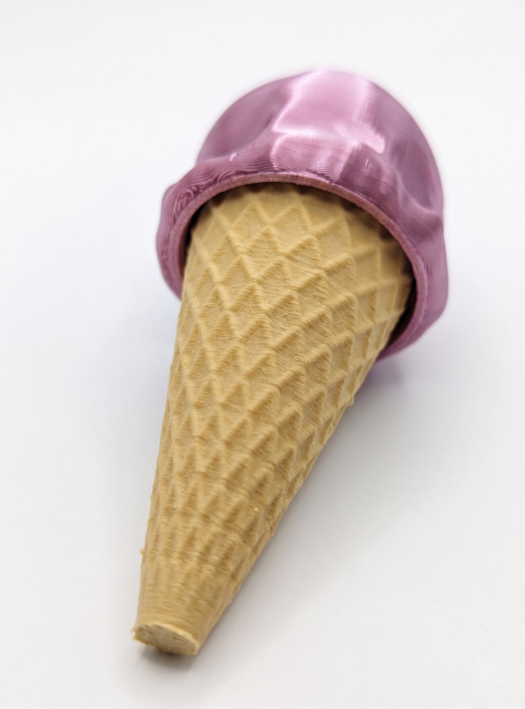 Rainbow Ice Cream Clicker photographed from the front bottom