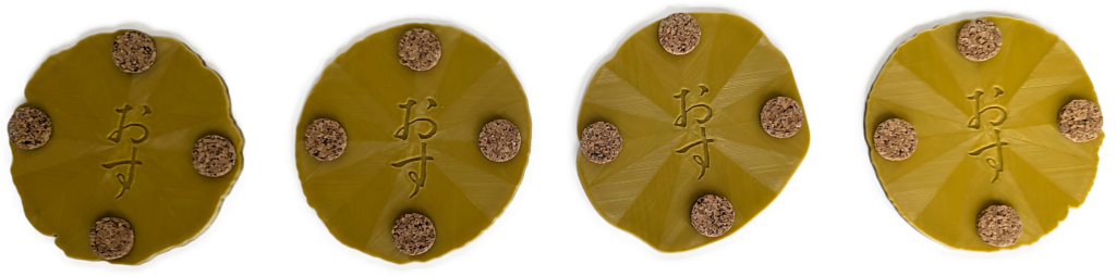 Set of 4 Micrometeorite Coasters photographed from the bottom
