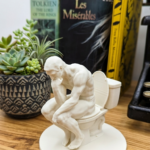 The Pensive Pooper displayed in a home